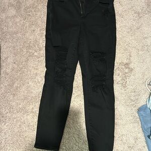 Black American Eagle ripped jeans size 12 stretchy